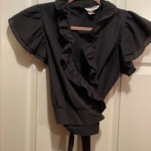 Black pull thru tie up In back,